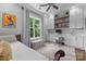 Cozy bedroom with a large window and built-in shelves and desk area at 2925 Westfield Rd, Charlotte, NC 28209