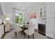 Elegant dining room featuring a round table, stylish chairs, and a built-in wine cooler at 2925 Westfield Rd, Charlotte, NC 28209