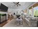 Inviting living room offering a seamless transition to the kitchen and dining area, filled with natural light at 2925 Westfield Rd, Charlotte, NC 28209