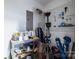 Well-organized storage room with pegboard, shelves, and various tools and supplies at 2925 Westfield Rd, Charlotte, NC 28209