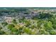 Scenic aerial view showcases the neighborhood's lush greenery and desirable location near stadium at 322 S Hill St, Gastonia, NC 28052