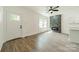 Open living area with natural light, modern fireplace, and sleek finishes at 322 S Hill St, Gastonia, NC 28052