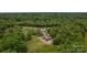 A sprawling property with a house, pool, barn, and mature trees at 3440 17Th Ne Ave, Hickory, NC 28601