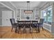 Elegant dining room with stylish lighting, hardwood floors, and decorative built-in shelving at 3440 17Th Ne Ave, Hickory, NC 28601