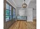 Inviting entryway with hardwood floors, modern light fixture, and stylish decor at 3440 17Th Ne Ave, Hickory, NC 28601