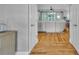 Bright living room with hardwood floors, a comfortable white sofa, and seamless access to the outdoor patio at 3440 17Th Ne Ave, Hickory, NC 28601
