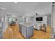Open-concept living room with modern finishes, stainless appliances, hardwood floors and plenty of natural light at 3440 17Th Ne Ave, Hickory, NC 28601