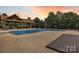 Large in-ground pool with a diving board, and a covered seating area perfect for outdoor entertaining at 3440 17Th Ne Ave, Hickory, NC 28601