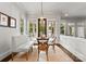 Charming breakfast nook with bench seating, a round table, and ample natural light at 400 Hunter Ln, Charlotte, NC 28211