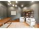 Stylish office boasts a modern light fixture, seating area, and hardwood floors at 400 Hunter Ln, Charlotte, NC 28211