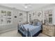 Cozy bedroom with a decorative iron bed frame and plenty of natural light at 4030 City Homes Pl, Charlotte, NC 28209
