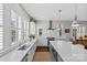 Gourmet kitchen with marble counters, stainless steel appliances, and ample storage at 4030 City Homes Pl, Charlotte, NC 28209