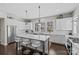 Bright kitchen features a large island with seating and stainless steel appliances at 4030 City Homes Pl, Charlotte, NC 28209