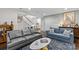 Comfortable living room with stylish sofas, a patterned rug, and access to other areas of the home at 4030 City Homes Pl, Charlotte, NC 28209