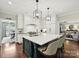 Bright kitchen with an island, stainless appliances, and lots of counter space at 4608 Morrowick Rd, Charlotte, NC 28226