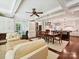 Open concept living area and kitchen with coffered ceilings and lots of natural light at 4608 Morrowick Rd, Charlotte, NC 28226