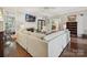 Bright living room with fireplace, neutral decor, and large sectional sofa, perfect for Gathering gatherings at 4608 Morrowick Rd, Charlotte, NC 28226