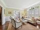 Bright living room featuring stylish furniture, large windows, and an inviting atmosphere at 4608 Morrowick Rd, Charlotte, NC 28226
