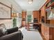 Well-appointed office with custom built-ins, hardwood floors, and a comfortable workspace at 4608 Morrowick Rd, Charlotte, NC 28226