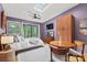 Charming bedroom with skylight, ceiling fan, and access to an outdoor area with a view of nature at 4609 Rounding Run Rd, Charlotte, NC 28277
