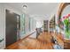 Inviting foyer with hardwood floors, large windows, and elegant decor that provides a warm welcome at 4609 Rounding Run Rd, Charlotte, NC 28277