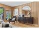 Relaxing living room with modern furniture and view of outdoor deck and natural landscape at 4609 Rounding Run Rd, Charlotte, NC 28277
