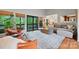 Bright living room featuring stylish furniture, large windows with natural light, and a spacious layout at 4609 Rounding Run Rd, Charlotte, NC 28277