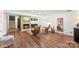 Finished basement showcasing a cozy fireplace, seating area, and stylish decor with modern flooring at 50 Honeysuckle Woods, Lake Wylie, SC 29710