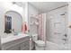 Bright bathroom featuring a shower over tub, a stylish vanity, and modern fixtures at 50 Honeysuckle Woods, Lake Wylie, SC 29710
