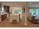 Open-concept kitchen with large island, modern appliances, and seamless flow to the living area at 50 Honeysuckle Woods, Lake Wylie, SC 29710