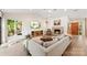 Spacious living room with a cozy fireplace and large screen TV at 50 Honeysuckle Woods, Lake Wylie, SC 29710