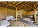 Relaxing outdoor patio space with comfortable seating and a serene atmosphere and wooden support beams above at 50 Honeysuckle Woods, Lake Wylie, SC 29710