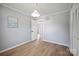 Bedroom with wood floors and soft grey walls, offering a bright and airy feel at 502 Kings Mountain St, Clover, SC 29710