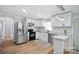 Updated kitchen featuring white cabinets, stainless steel appliances, and granite countertops at 502 Kings Mountain St, Clover, SC 29710