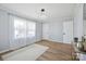 Bright living room featuring hardwood floors, modern lighting and natural light at 502 Kings Mountain St, Clover, SC 29710