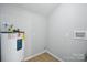 This utility room features a water heater and utility hookups at 502 Kings Mountain St, Clover, SC 29710