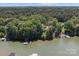 Wide angle aerial of the lakefront property showcasing stunning water views at 505 Kemp Rd, Mooresville, NC 28117