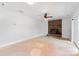 Bright living room featuring brick fireplace and sliding glass door to the outside at 505 Kemp Rd, Mooresville, NC 28117