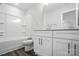 Well-lit bathroom featuring a tub-shower combo and vanity with modern fixtures at 5103 Heathland Dr # 50, Charlotte, NC 28215
