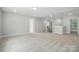 Spacious bonus room with plush carpeting and ample natural light from multiple windows at 5103 Heathland Dr # 50, Charlotte, NC 28215
