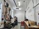 Organized garage with ample storage, including shelving, pegboards, and cabinets, offering functionality and workspace at 534 Ballymote Ct, Matthews, NC 28104