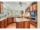 Spacious kitchen with granite counters, stainless appliances, and center island at 534 Ballymote Ct, Matthews, NC 28104