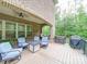 A spacious back deck has outdoor seating, a grill and is perfect for gatherings at 6004 Quintessa Dr, Matthews, NC 28104