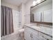Bathroom with granite countertops and tub shower combo at 6004 Quintessa Dr, Matthews, NC 28104