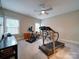 Spacious bedroom with exercise equipment and a ceiling fan at 6004 Quintessa Dr, Matthews, NC 28104