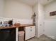 Convenient coffee bar with mini fridge, cabinets, and countertop space at 6004 Quintessa Dr, Matthews, NC 28104