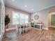 Bright dining area featuring a table, chairs, and natural light at 6004 Quintessa Dr, Matthews, NC 28104