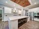 Modern kitchen with island seating and stainless steel appliances at 6004 Quintessa Dr, Matthews, NC 28104