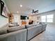 Large living room with a big sofa and tv at 6004 Quintessa Dr, Matthews, NC 28104