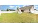 Spacious backyard features a white fence and two teepee tents at 7113 Meridale Forest Dr, Charlotte, NC 28269